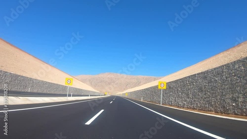 Hasankeyf, Turkey - October 2019: Point of View driving hyper lapse on country route, travel concept dashcam POV towards Hasankeyf photo