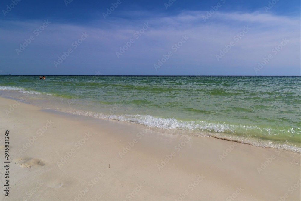 Beautiful ocean views from Florida beach, calm ocean waters, clear skies, clear skyline