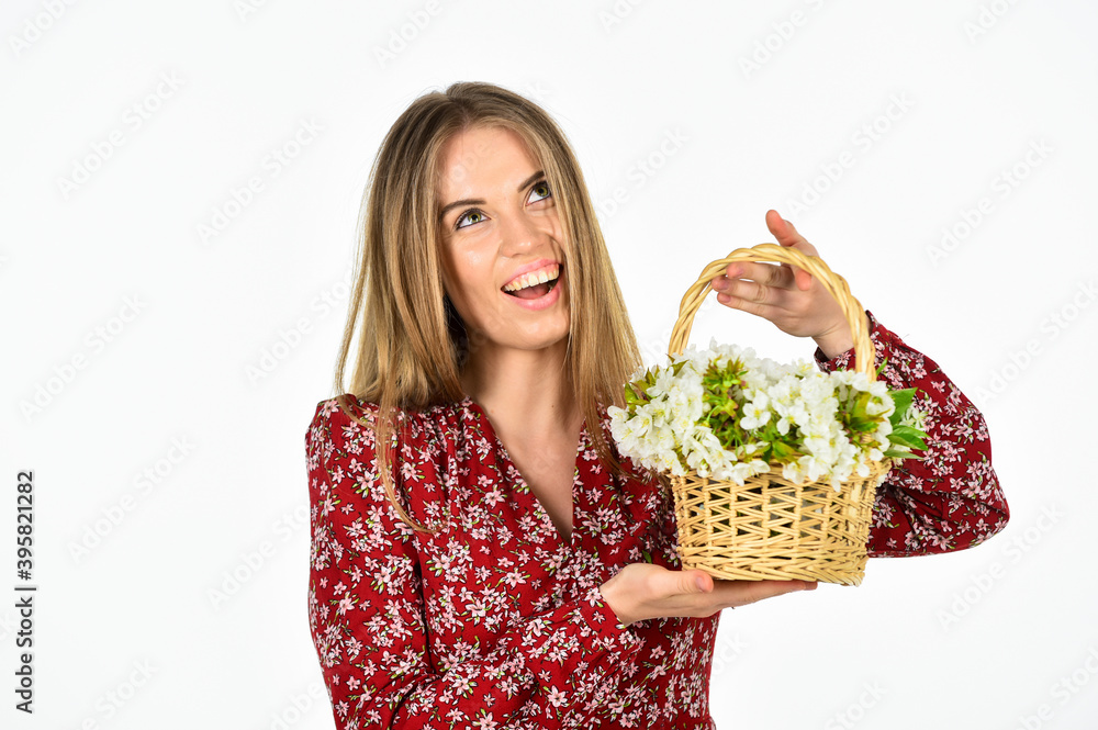 happy woman carry flowers in basket. spring blossom arrangement. beautiful summer bloom. female florist designer. womens and mothers day. girl at flower shop. natural holiday gift happy woman carry flowers in basket. spring blossom arrangement. beautiful summer bloom. female florist designer. womens and mothers day. girl at flower shop. natural holiday gift