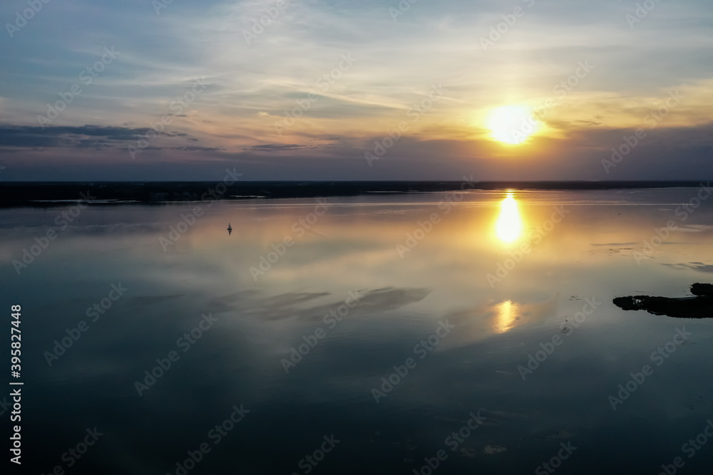 Obraz premium sunset on the lake and small island