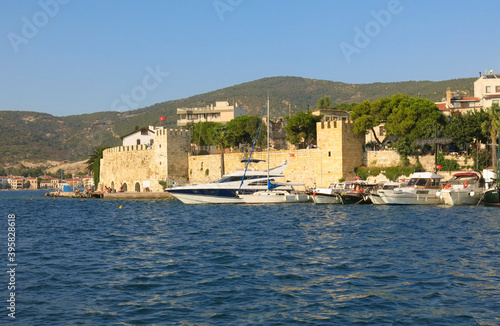 Fototapeta Naklejka Na Ścianę i Meble -  Castle of Foca in Izmir along with luxury yachts parked.