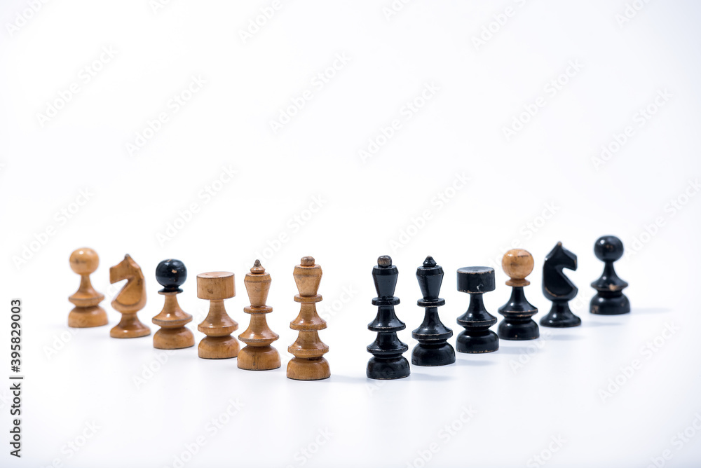 Old Chess Set - Full Set of 12 pieces on a white background with copy space Old Chess Set - Full Set of 12 pieces on a white background with copy space