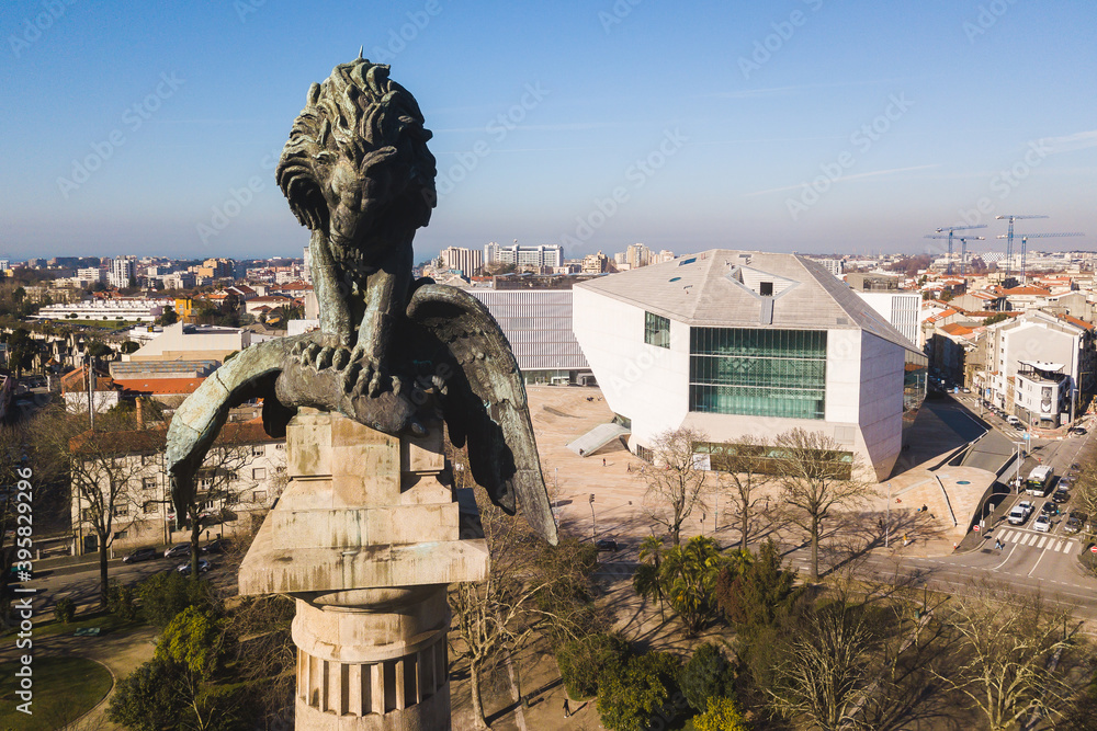 Obraz premium Casa da Música Porto Portugal view of a city monument Rotunda da Boavista Praça de Mouzinho de Albuquerque lion drone shot aerial