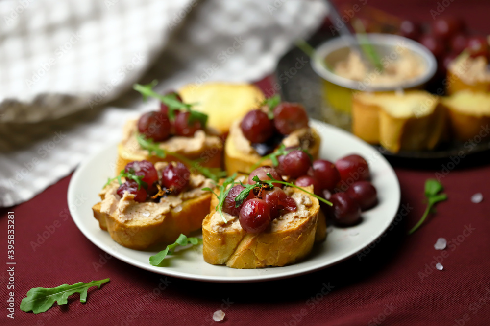 Selective focus. Macro. Canapes with pate and grapes. Healthy snack. Christmas food.