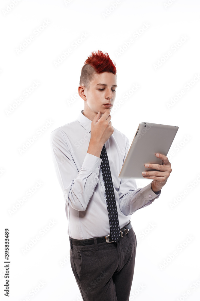 Teenager with tablet computer on white background. Teenager with tablet computer on white background.
