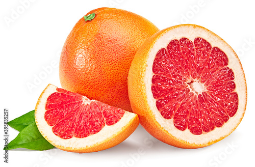 sliced grapefruit with green leaves isolated on white background. full depth of field. clipping path