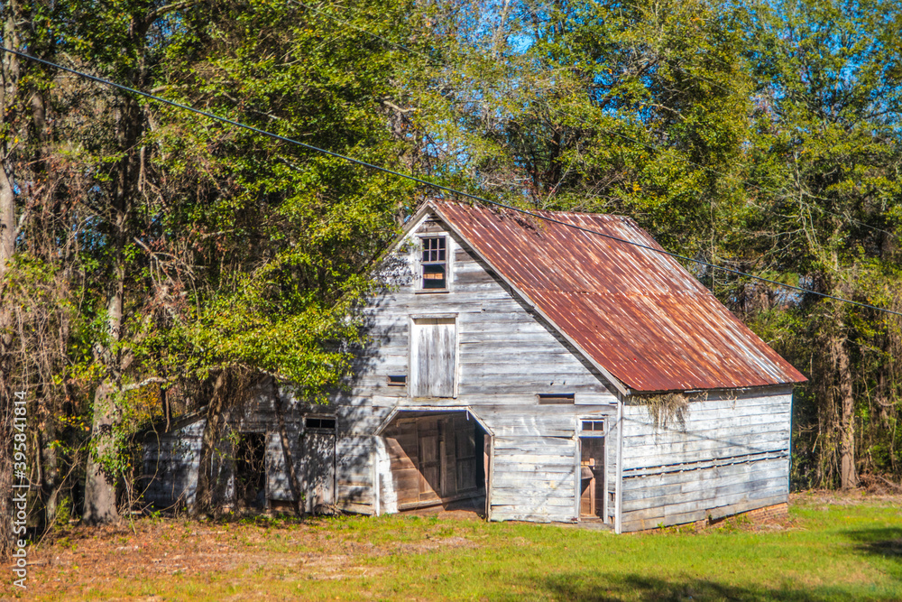 Old wooden rustic style barn in rural Georgia front corner Old wooden rustic style barn in rural Georgia front corner