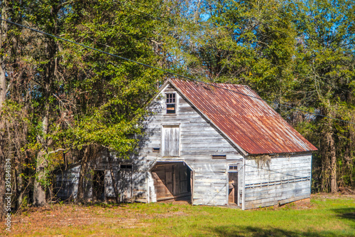 Old wooden rustic style barn in rural Georgia front corner