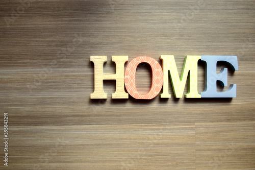 HOME letters on a wooden background