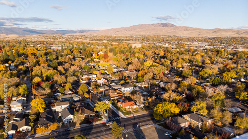 Drone  photo of Reno neighborhoods during the fall sesason looking towards the mountains. photo