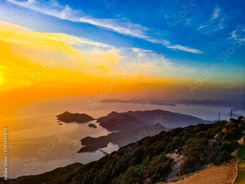 Beautiful picturesque scenic view of golden hour sunset from mountain