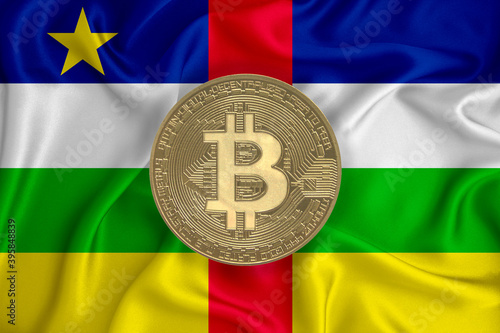 Central African Republic flag, bitcoin gold coin on flag background. The concept of blockchain, bitcoin, currency decentralization in the country. 3d-rendering photo