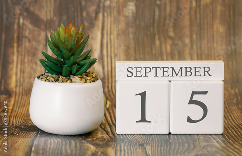 Flower pot and calendar for the cool season from 15 September. Autumn time.