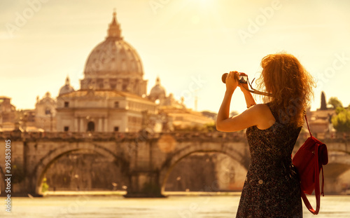 Canvas Print Girl tourist takes photo of sunny Rome, Italy, Europe