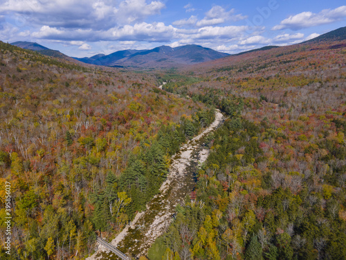 Aerial view of Pemigewasset River valley with fall foliage near Lincoln Woods on Kancamagus Highway in White Mountain National Forest, Town of Lincoln, New Hampshire NH, USA. photo