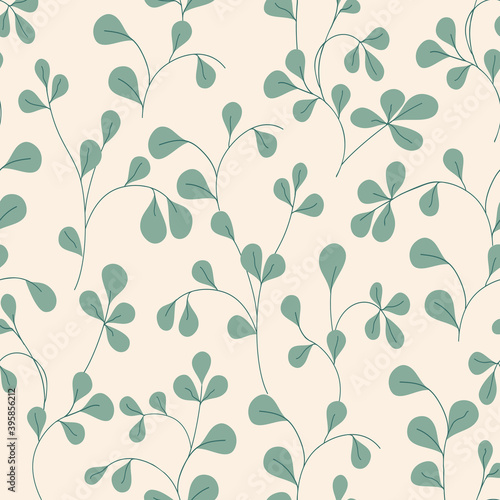 Green leaves on cream background repeat design