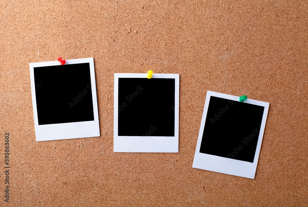 Blank photographs on a bulletin board Stock Photo Adobe Stock