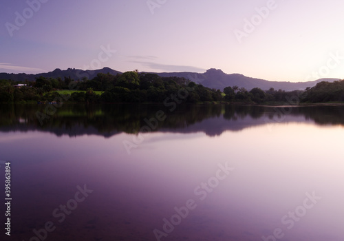 purple twilight reflection sunset over lake mountains autumn nature landscape brazil / crepusculo roxo ceu por do sol reflexo lago lagoa da veterinaria igarape minas gerais mg brasil