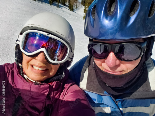 Selfie of senior couple skiing in Aspen, Colorado, on nice sunny day