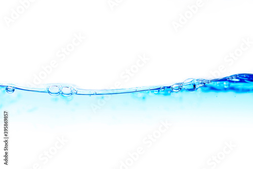 Blue water wave surface with bubbles on white background.