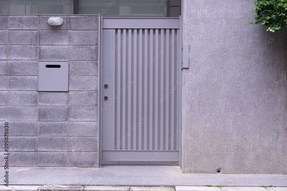 Fototapeta premium sidewalk by street wall & door