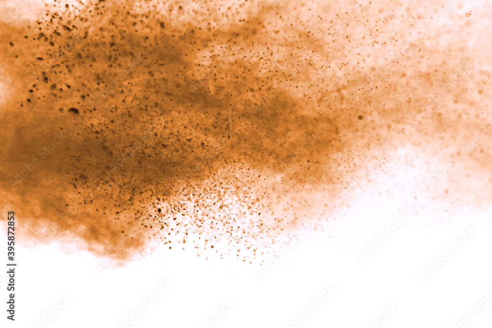 Brown powder explosion isolated on white background. Brown powder explosion isolated on white background.