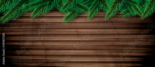 Fir Branches on Wooden Background. Pine Sprigs on Above. Christmas and New Year Decoration.