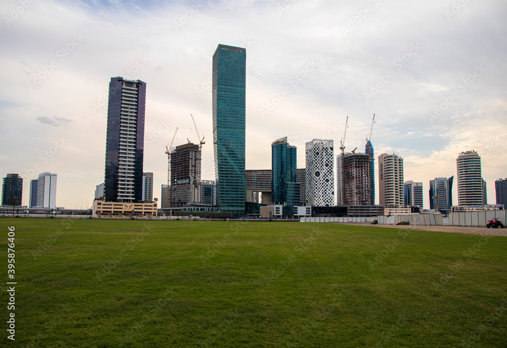 Modern buildings along the Dubai water canal, business bay district UAE Modern buildings along the Dubai water canal, business bay district UAE