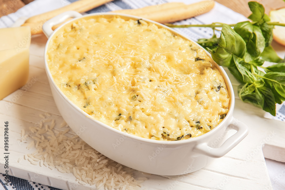Baking dish with tasty rice casserole on table Baking dish with tasty rice casserole on table