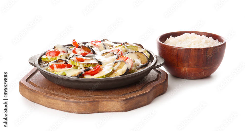 Baking dish with tasty rice casserole on white background Baking dish with tasty rice casserole on white background