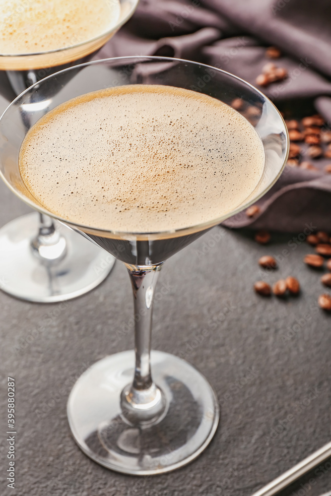 Two glasses of tasty espresso martini cocktail on table Two glasses of tasty espresso martini cocktail on table