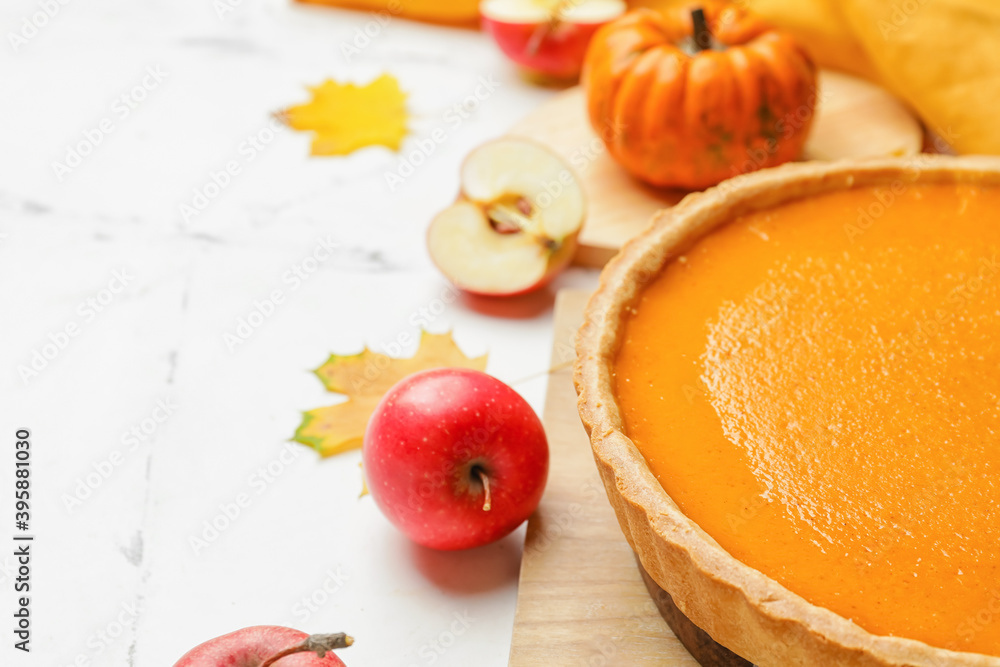 Tasty pumpkin pie on light background, closeup Tasty pumpkin pie on light background, closeup