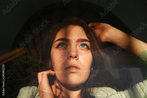 Beauty and shape. Young beautiful woman above old round wooden staircase.  double exposure. Portrait  young caucasian girl around circle stair photo