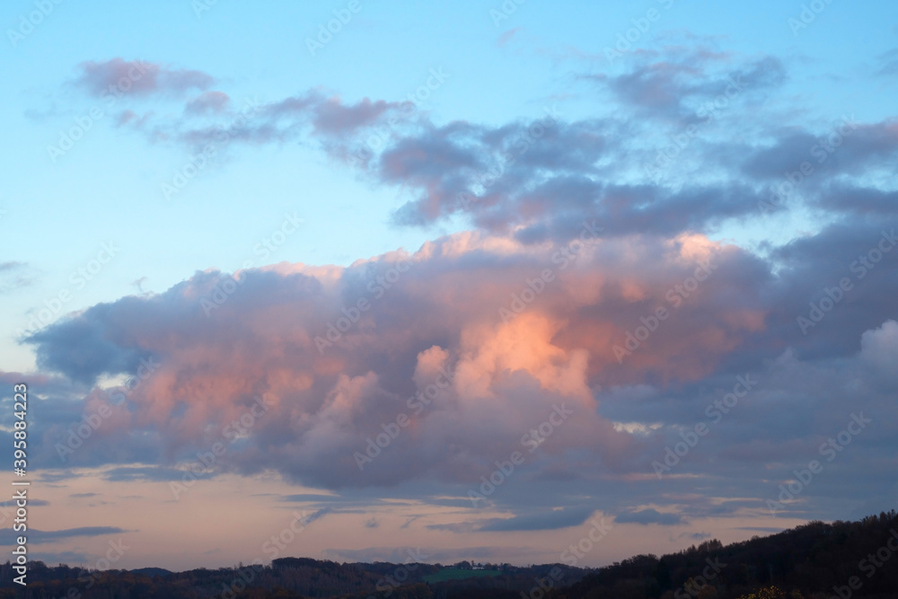 Landscape with pastel-colored clouds Landscape with pastel-colored clouds