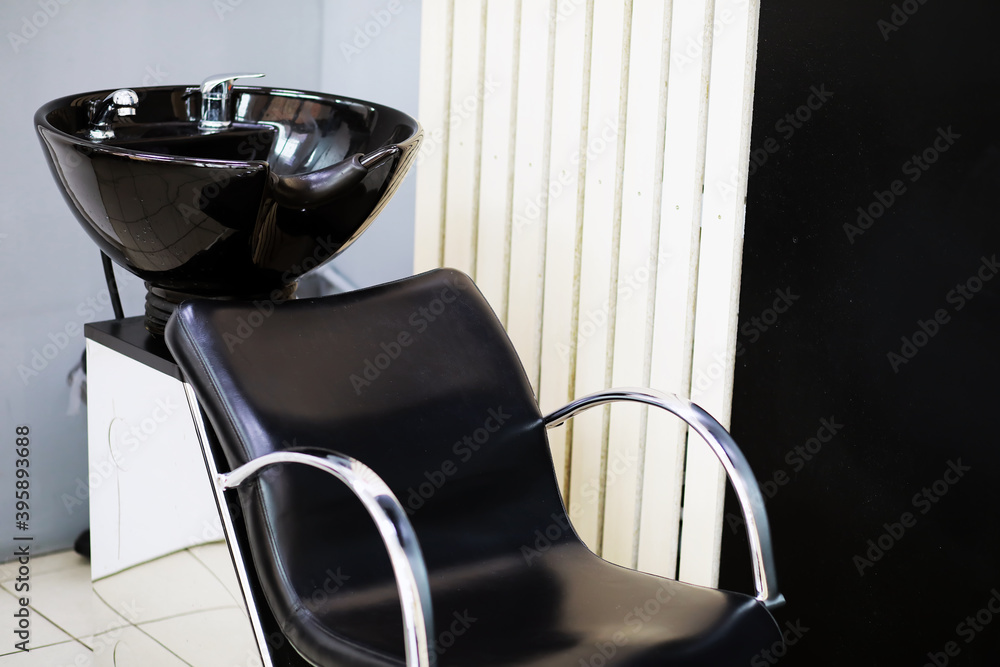 professional chairs for washing hairs before and after haircut Stock