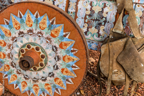 Geometric and colorful decorations of the wheels of traditional coffee transport carts in Costa Rica, Sarchi