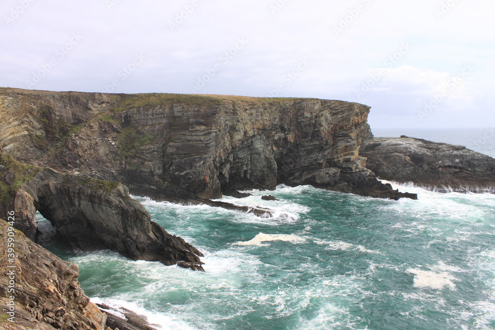 Coastline of Mizen Head in stormy weather, Ireland