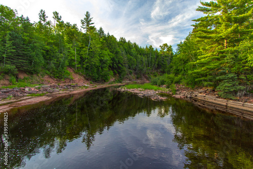 Forest River Landscape. Boreal forest wilderness scene and river on the Prickett River in the Upper Peninsula of Michigan.