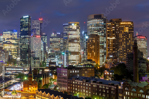 Sydney, New South Wales, Australia ; Sydney skyline illuminated at night.