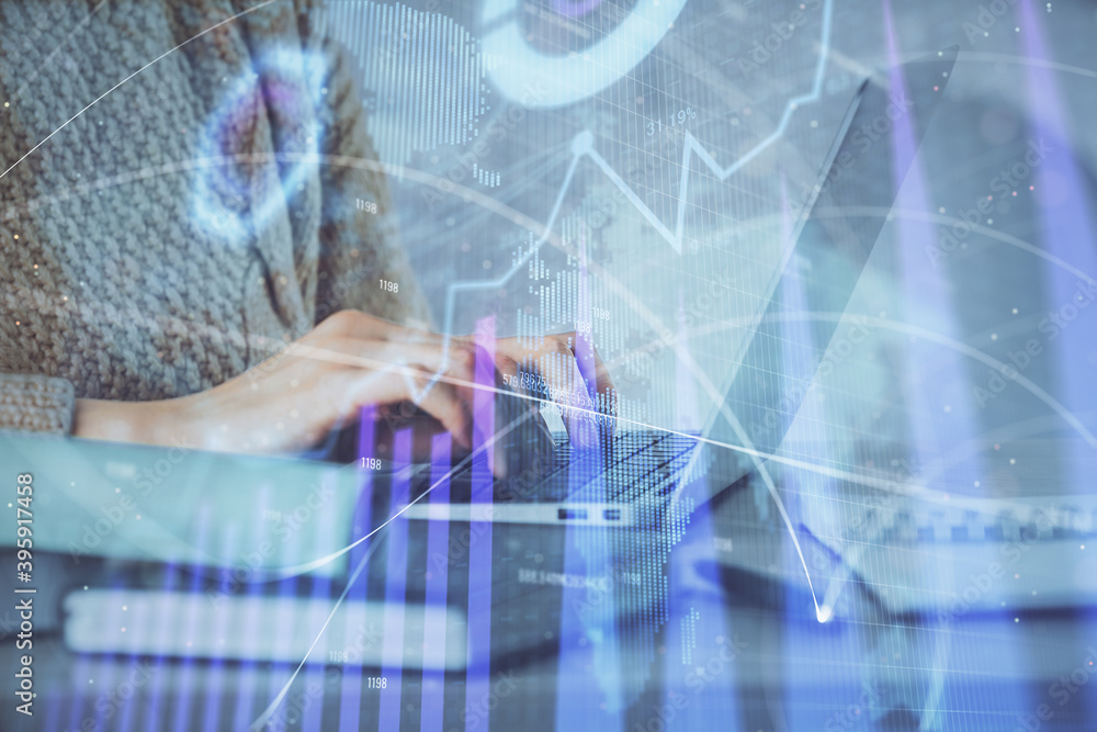Double exposure of woman hands typing on computer and forex chart hologram drawing. Stock market analysis concept. Double exposure of woman hands typing on computer and forex chart hologram drawing. Stock market analysis concept.
