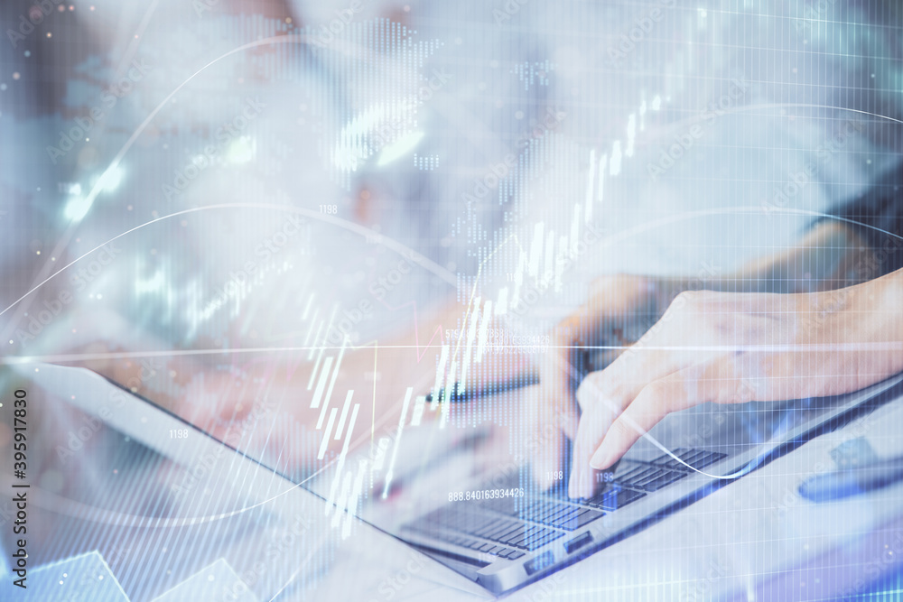Double exposure of woman hands typing on computer and forex chart hologram drawing. Stock market invest concept.