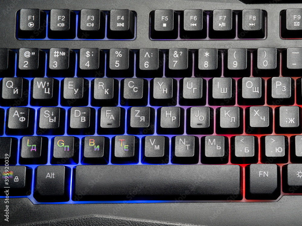 close up of backlit QWERTY keyboard with LGBT keys close up of backlit QWERTY keyboard with LGBT keys