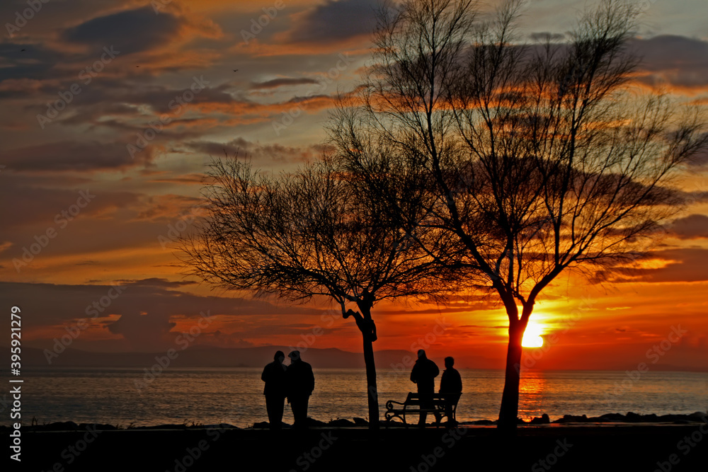 Photos of people in silhouette at sunset Photos of people in silhouette at sunset