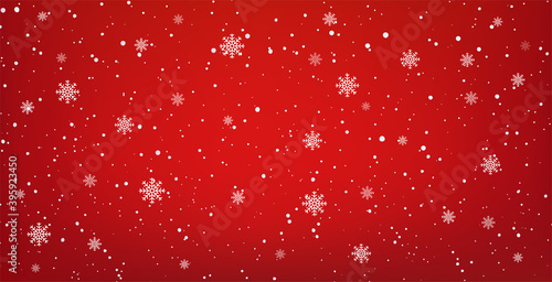 Snowy red background with falling snowflakes. Christmas winter snowfall with white snow flakes.