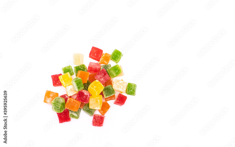 Mountain of appetizing colorful cubes Rahat Lokum on a white background Mountain of appetizing colorful cubes Rahat Lokum on a white background