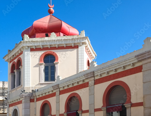 Famous mercado building in Loule with a pink roof photo