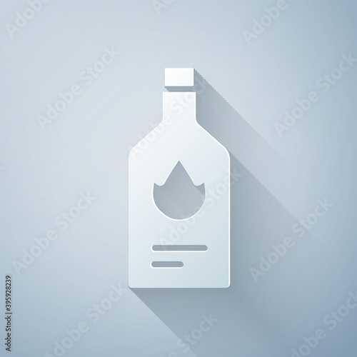 Paper cut Tabasco sauce icon isolated on grey background. Chili cayenne spicy pepper sauce. Paper art style. Vector.