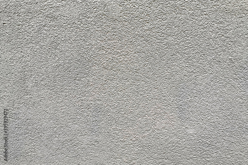 Fragment of a gray concrete wall.