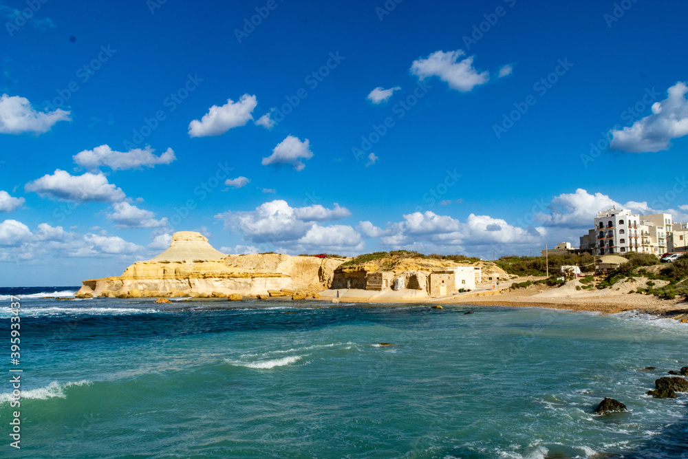 Xwejni Bay in Gozo with the Qolla l-Bajda (the White Hillock) in the background.