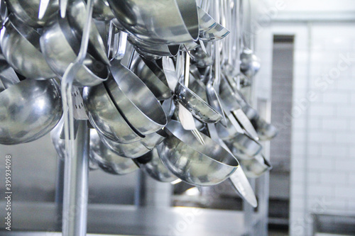 фотографія detail of hanging professional kitchen tools